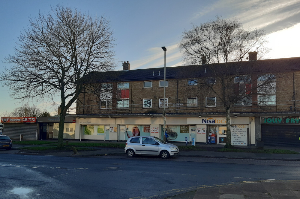 This image: photo of the shops on Marwood Road.
						The map: the map shows a red line around Stocking Farm Neighbourhood Centre.